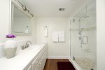 The master bath has been tastefully remodeled and has a very nice walk in shower